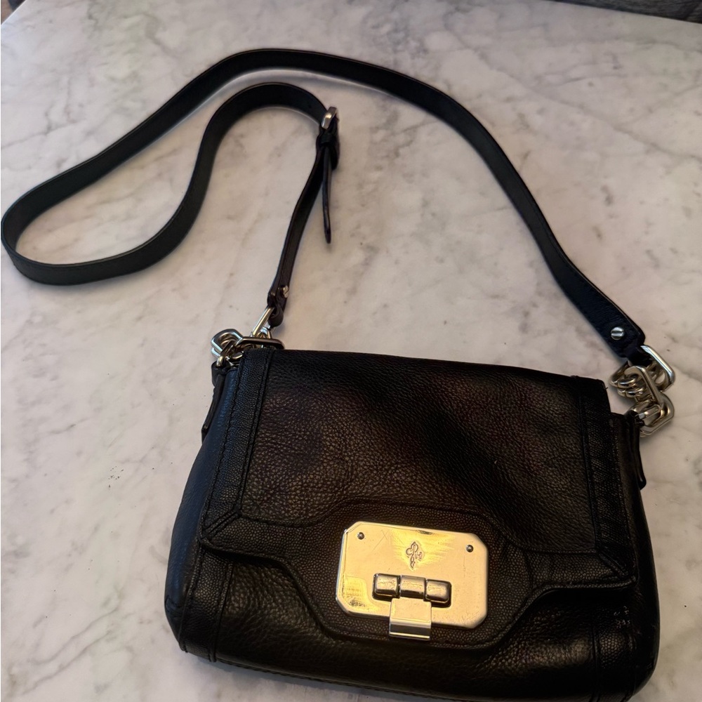 Cole Haan Black and Gold Crossbody Bag with Versatile Design